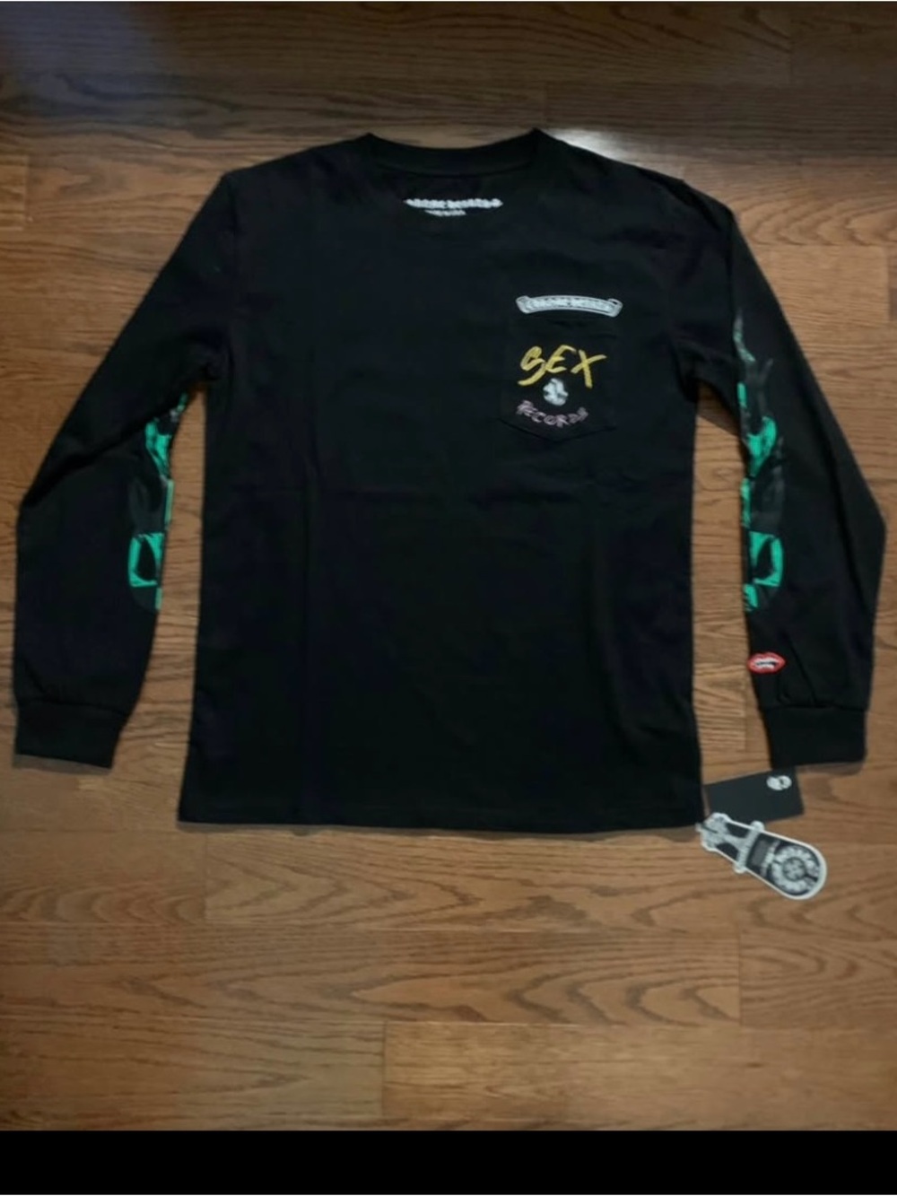 Black Long Sleeve Shirt with Green Sleeve Graphics